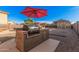 Backyard grill station with built-in barbecue, ideal for outdoor cooking and entertaining in the backyard at 22157 W Moonlight Path, Buckeye, AZ 85326