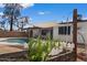 A backyard with a refreshing pool and a cozy covered patio for outdoor relaxation at 2230 W Peralta Ave, Mesa, AZ 85202