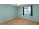 A relaxing bedroom with natural light from the window at 2230 W Peralta Ave, Mesa, AZ 85202
