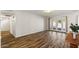 Bright living room with beautiful floors and access to the backyard through french doors at 2230 W Peralta Ave, Mesa, AZ 85202