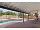 Sparkling pool with covered patio and outdoor seating at 2230 W Peralta Ave, Mesa, AZ 85202