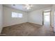 Bright bedroom with a ceiling fan and window, offering a comfortable and airy space at 2326 E Waltann Ln, Phoenix, AZ 85022