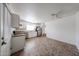 Bright eat-in kitchen with stainless steel appliances, white cabinets, and tile flooring at 2326 E Waltann Ln, Phoenix, AZ 85022