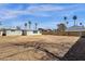 Expansive backyard enclosed by a block fence, providing ample space for entertainment at 2545 E Amelia Ave, Phoenix, AZ 85016