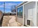 The backyard features a shed with a doggie door, a brick pathway, and mature landscaping at 2545 E Amelia Ave, Phoenix, AZ 85016