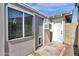 Backyard shed with window and entry door, offering extra storage, potential for a workshop or studio at 2545 E Amelia Ave, Phoenix, AZ 85016