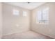 Comfortable bedroom with carpet flooring and natural light from windows at 2621 E Stottler Dr, Gilbert, AZ 85296