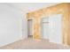 Bedroom featuring closet with sliding doors and neutral carpet flooring at 2621 E Stottler Dr, Gilbert, AZ 85296