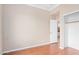 Bedroom with wood floors and a view of the walk-in closet at 2621 E Stottler Dr, Gilbert, AZ 85296