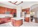 Kitchen featuring an island and seamless transition into the adjacent living space at 2621 E Stottler Dr, Gilbert, AZ 85296