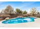 Beautiful backyard pool with rock feature and a private, fenced yard at 2621 E Stottler Dr, Gilbert, AZ 85296
