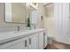 This bathroom offers double sinks, framed mirrors, and neutral colors at 3344 E Grand Canyon Dr, Chandler, AZ 85249
