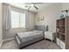 This bedroom has a window, carpeted floor, a bed and other furniture at 3344 E Grand Canyon Dr, Chandler, AZ 85249