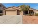 Charming single-story home with a three-car garage and well-maintained landscaping at 3344 E Grand Canyon Dr, Chandler, AZ 85249