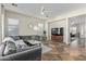Spacious living room with tiled floors, modern furnishings, and a bright atmosphere at 3344 E Grand Canyon Dr, Chandler, AZ 85249