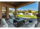 Charming covered patio with stylish furniture and an inviting outdoor space at 3344 E Grand Canyon Dr, Chandler, AZ 85249