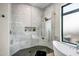 Contemporary bathroom with a glass-enclosed shower, and modern finishes at 39705 N 3Rd St, Phoenix, AZ 85086