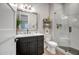 Modern bathroom features a sleek vanity, shower with glass door and modern finishes at 39705 N 3Rd St, Phoenix, AZ 85086