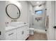 Modern bathroom with a walk-in shower, floating vanity, and sleek finishes at 39705 N 3Rd St, Phoenix, AZ 85086