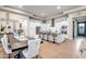 Open layout featuring a spacious kitchen with a large island, dining area and seating at 39705 N 3Rd St, Phoenix, AZ 85086