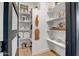 Organized pantry with ample shelving, providing convenient storage space for kitchen essentials at 39705 N 3Rd St, Phoenix, AZ 85086