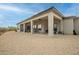 A covered outdoor patio features an open lounging area with ceiling fans at 39705 N 3Rd St, Phoenix, AZ 85086