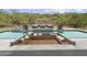 Outdoor pool area with lounge seating, water feature, and mountain views at 39705 N 3Rd St, Phoenix, AZ 85086