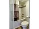 Cozy bathroom featuring a shower and tub combination with a tiled surround at 461 W Holmes Ave # 308, Mesa, AZ 85210