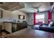 Open living room showcasing modern furnishings, bright accents, and an eat-in kitchen at 461 W Holmes Ave # 308, Mesa, AZ 85210