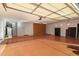 Spacious garage with epoxy floor, storage cabinets, and modern lighting at 4845 S Strike-It-Rich Dr, Gold Canyon, AZ 85118