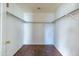 Walk-in closet with carpet flooring and metal hanging rods for storage at 5619 S 21St Pl, Phoenix, AZ 85040