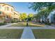 Serene community featuring lush green spaces and well-manicured landscaping, fostering a tranquil atmosphere at 5619 S 21St Pl, Phoenix, AZ 85040