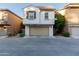 Attached garage offers convenient parking and extra storage in this contemporary residence at 5619 S 21St Pl, Phoenix, AZ 85040