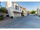 Attached garages provide convenience and secure parking in this multi-unit dwelling at 5619 S 21St Pl, Phoenix, AZ 85040