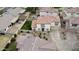 Aerial view of a two-story home with desert landscaping, a private yard, and tile roofing at 671 E Colt Ct, Chandler, AZ 85225