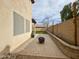Brick-paved patio complete with hanging lights and a fire pit, perfect for relaxing evenings at 671 E Colt Ct, Chandler, AZ 85225