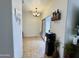 Bright dining area featuring tile floors, wine storage, and sliding glass doors at 671 E Colt Ct, Chandler, AZ 85225