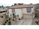Two-story home featuring desert landscaping, a private yard, and a red tiled roof at 671 E Colt Ct, Chandler, AZ 85225