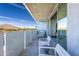 An inviting balcony that features tiled walls and modern outdoor furniture, ideal for relaxing and outdoor enjoyment at 6850 E Main St # 4404, Scottsdale, AZ 85251