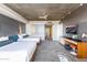 Spacious bedroom featuring two queen beds, modern decor, and ample lighting at 6850 E Main St # 4404, Scottsdale, AZ 85251