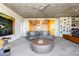 Open living space with a dining area, comfortable sectional sofa and television at 6850 E Main St # 4404, Scottsdale, AZ 85251