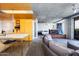 Modern living space with a dining area, comfortable sofa and television at 6850 E Main St # 4404, Scottsdale, AZ 85251