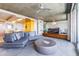 Modern living space with a dining area, comfortable sofa and television at 6850 E Main St # 4404, Scottsdale, AZ 85251
