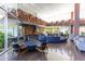Bright lobby with cozy seating, fireplace, unique architectural elements, and large windows at 6850 E Main St # 4404, Scottsdale, AZ 85251
