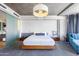 This expansive main bedroom boasts a king-sized bed, modern lighting, and seamless access to the bathroom at 6850 E Main St # 4404, Scottsdale, AZ 85251