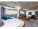 Bright and airy main bedroom featuring a comfortable lounge area, large television and a beautiful outdoor view at 6850 E Main St # 4404, Scottsdale, AZ 85251