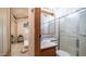 Bathroom with shower, tile and vanity adjacent to the main bedroom at 711 Felspar Dr, Apache Junction, AZ 85119