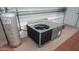 Side of the home featuring HVAC unit and propane tank at 711 Felspar Dr, Apache Junction, AZ 85119