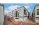 Exterior view of the home featuring a low maintenance yard and red brick groundcover at 711 Felspar Dr, Apache Junction, AZ 85119