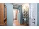 Hallway features hardwood floors and leads to other areas of the home. It has nice decor at 711 Felspar Dr, Apache Junction, AZ 85119